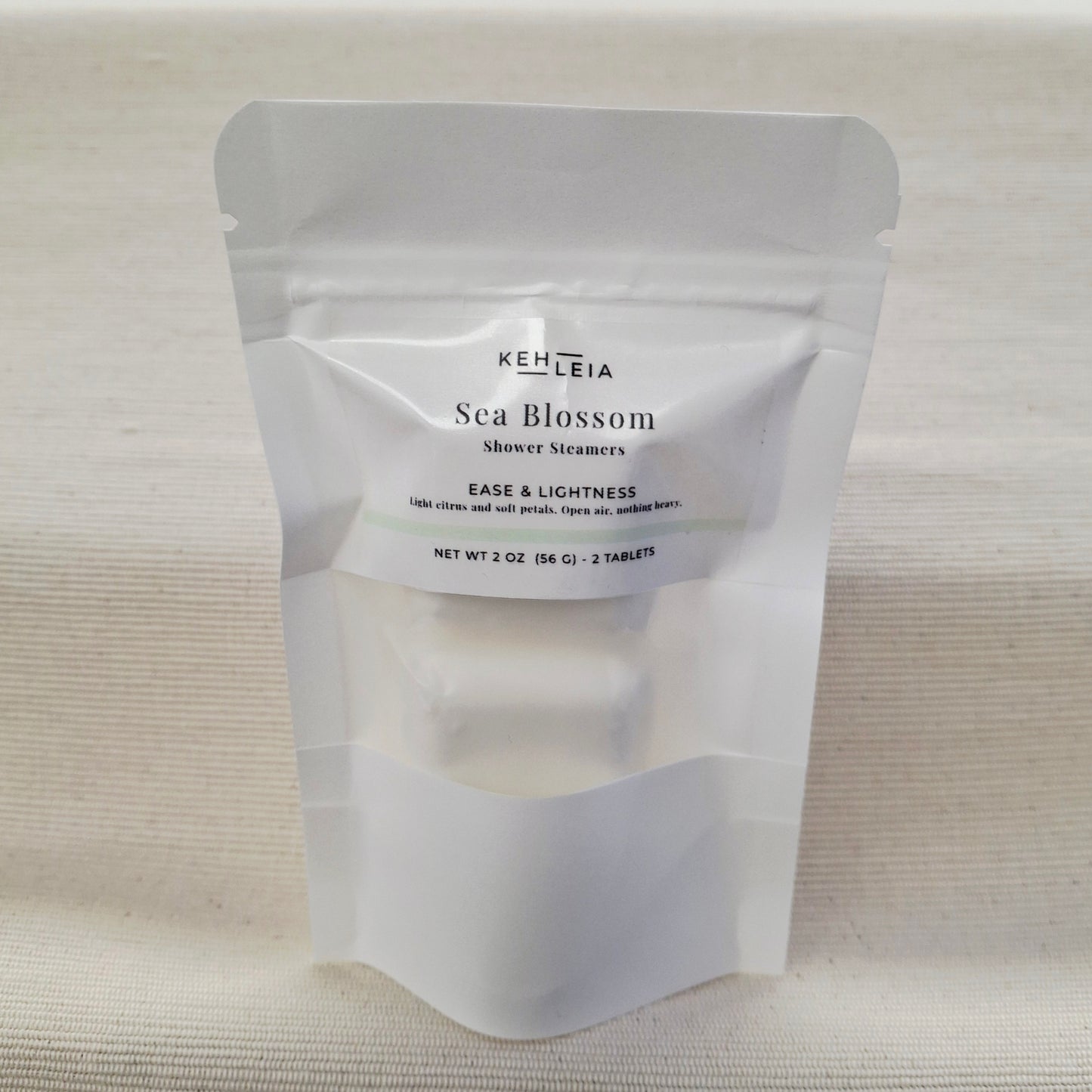 KehLeia Sea Blossom shower steamers packaging on a textured beige background
